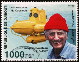 Jacques Cousteau and his bathyscaphe on postage stamp